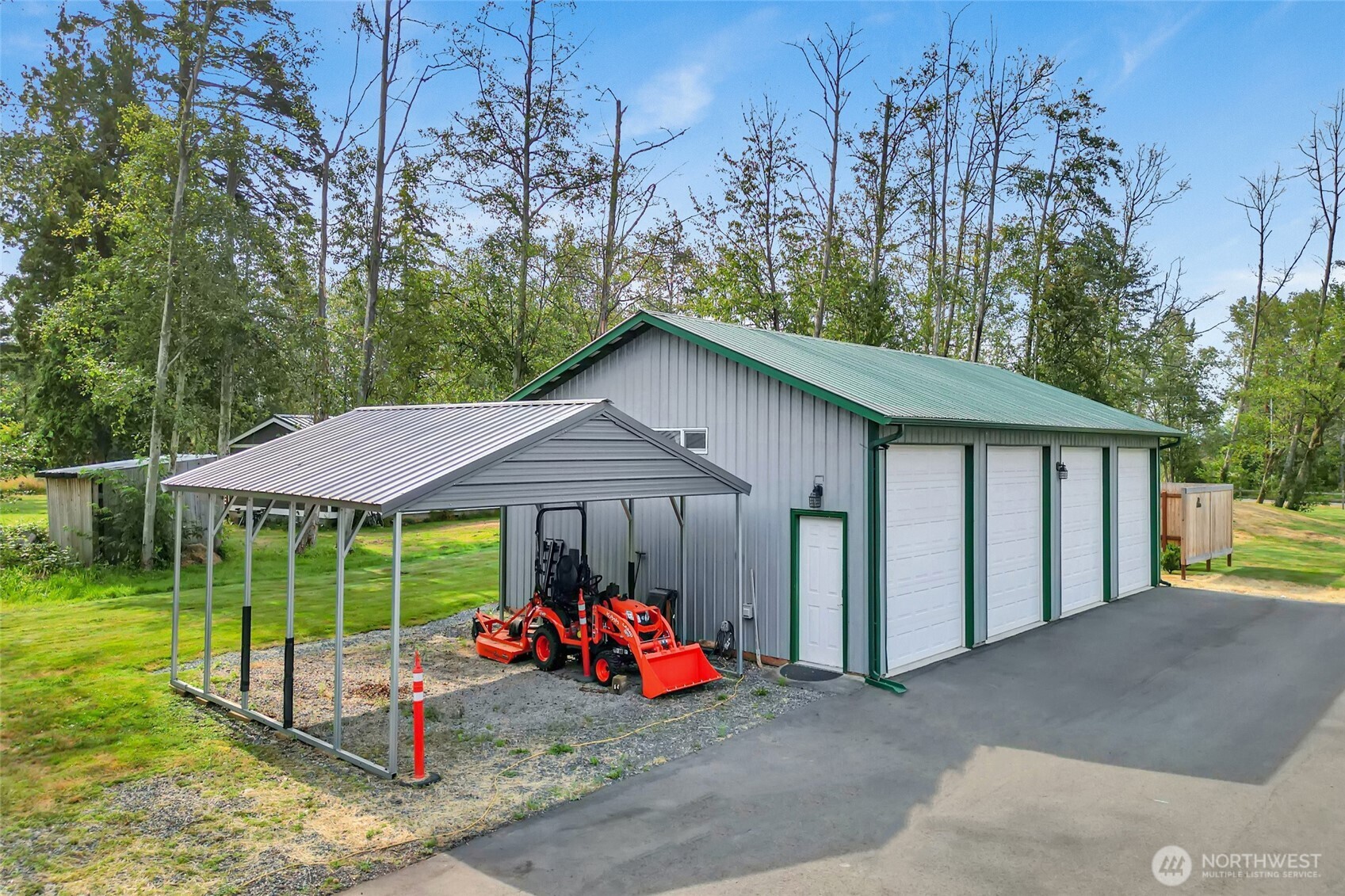 3240 Douglas Road Ferndale, WA 98248 - Photo 28 of 40 a view of a house with porch and garden