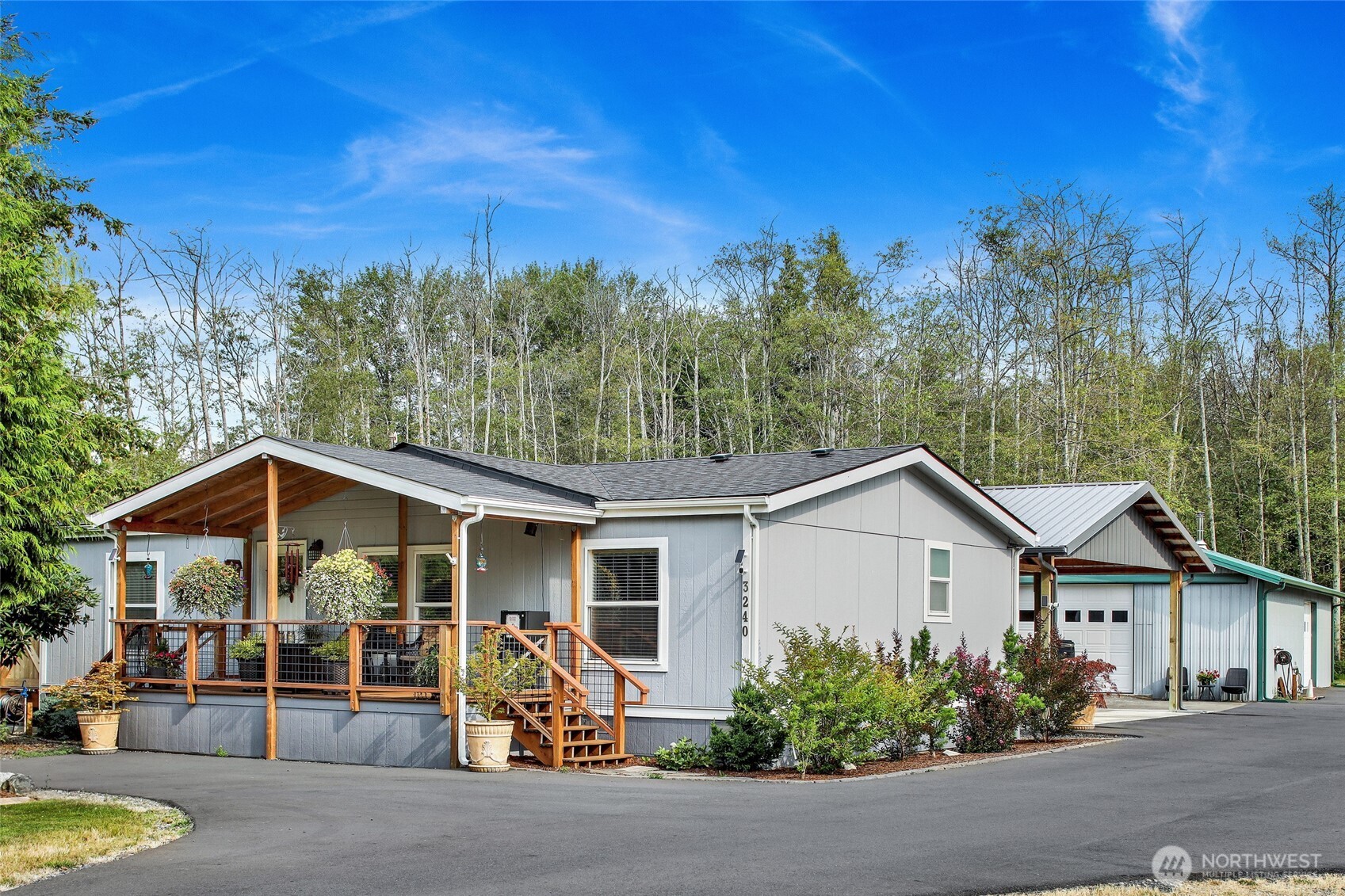 3240 Douglas Road Ferndale, WA 98248 - Photo 29 of 40 a view of a house with wooden fence