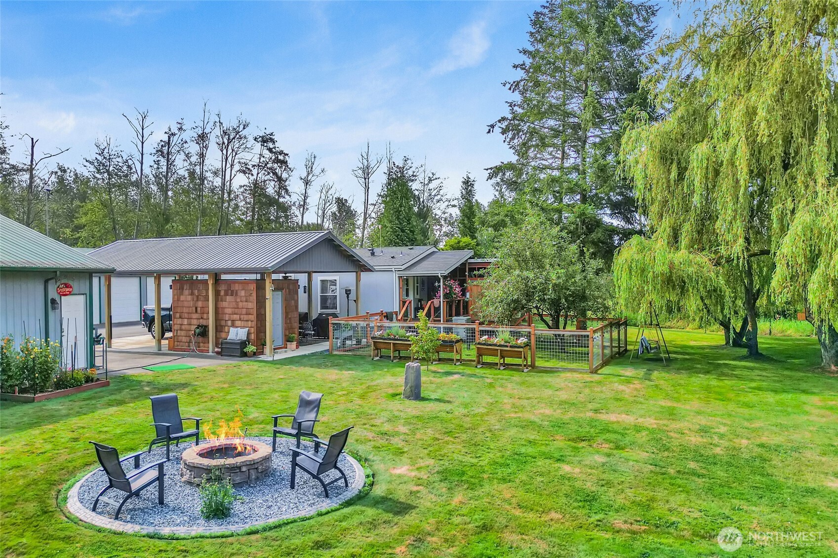 3240 Douglas Road Ferndale, WA 98248 - Photo 30 of 40 a view of a house with a yard porch and sitting area