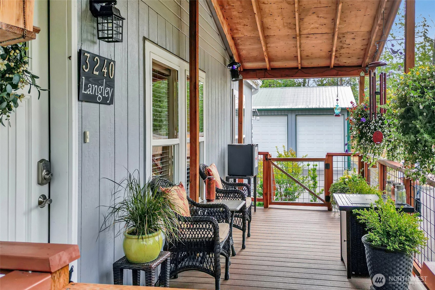 3240 Douglas Road Ferndale, WA 98248 - Photo 6 of 40 a view of balcony and patio with swimming pool and furniture