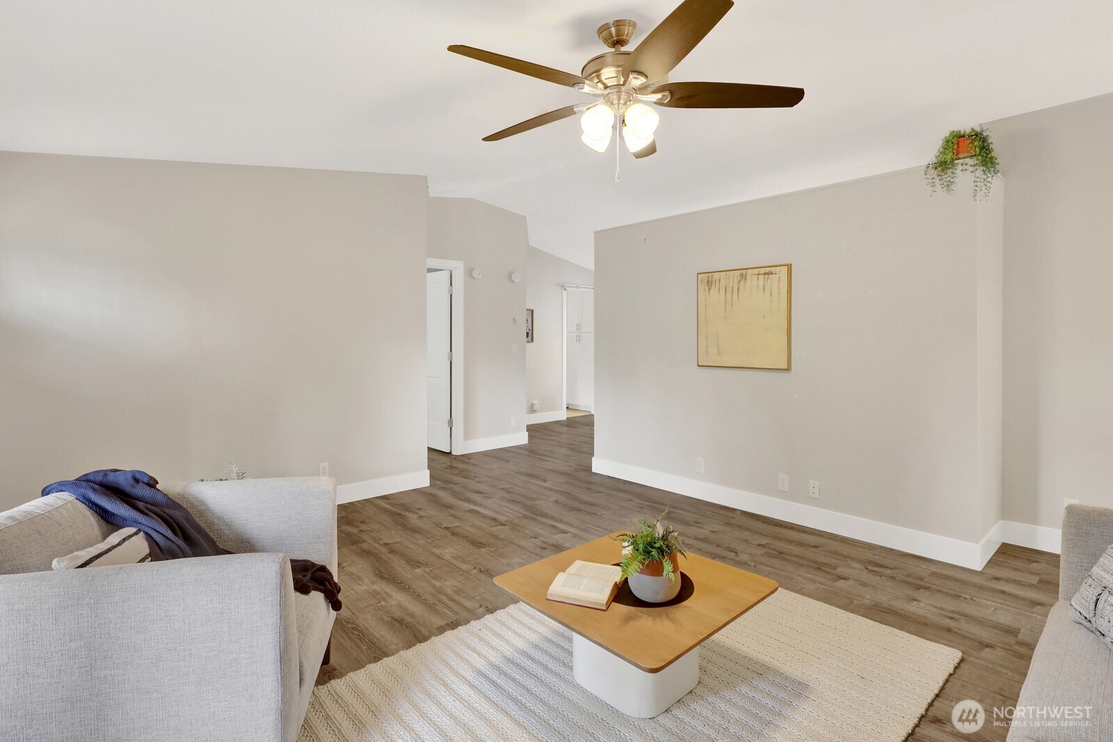 3240 Douglas Road Ferndale, WA 98248 - Photo 9 of 40 a living room with furniture and a wooden floor