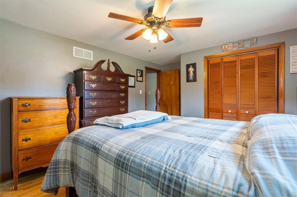 12490 Adams Drive Irwin, PA 15642 - Photo 12 of 33 a bedroom with a bed and a dresser