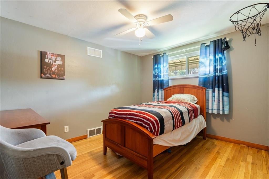 12490 Adams Drive Irwin, PA 15642 - Photo 13 of 33 a bedroom with a bed and window