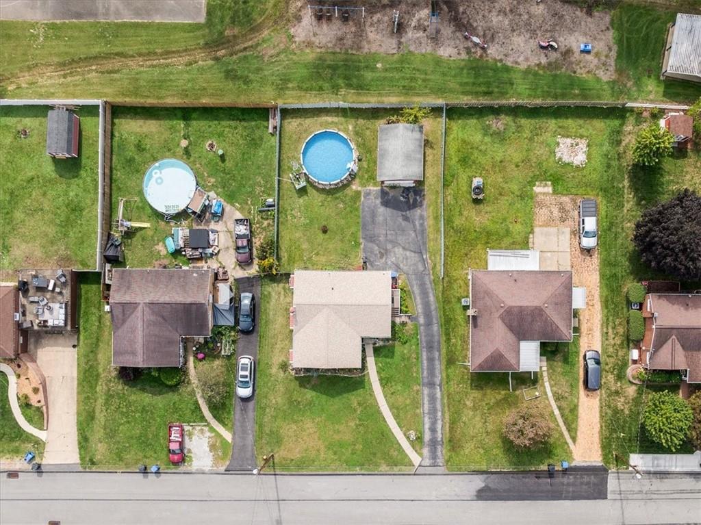 12490 Adams Drive Irwin, PA 15642 - Photo 29 of 33 an aerial view of residential houses with outdoor space and lake view
