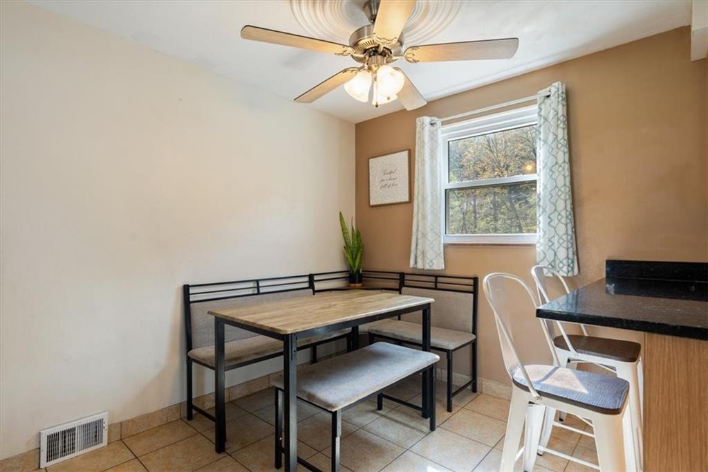 12490 Adams Drive Irwin, PA 15642 - Photo 9 of 33 a view of a workspace with furniture and a window