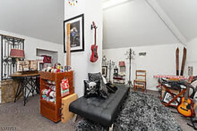 a living room filled with furniture and a couch