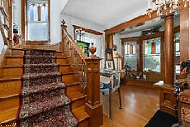 front view of a house with outdoor seating