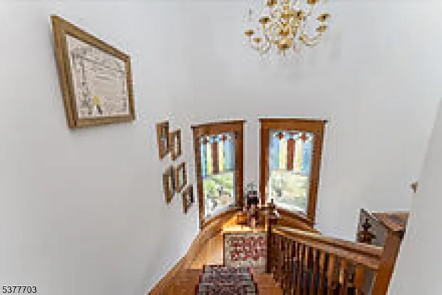 a view of a hallway with windows