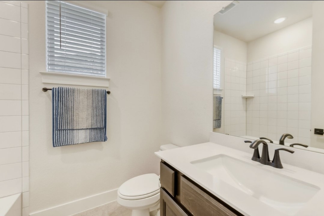 154 Kimble Creek Loop Kyle, TX 78640 - Photo 16 of 20 Full bathroom featuring vanity and bathtub / shower combination