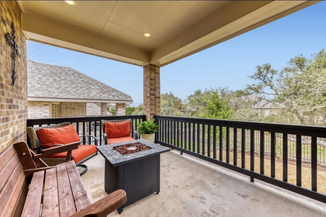 154 Kimble Creek Loop Kyle, TX 78640 - Photo 17 of 20 Balcony featuring a fire pit