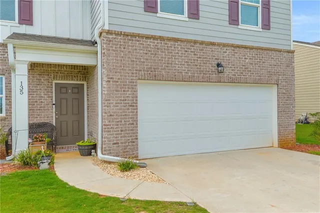 a view of entrance gate of the house