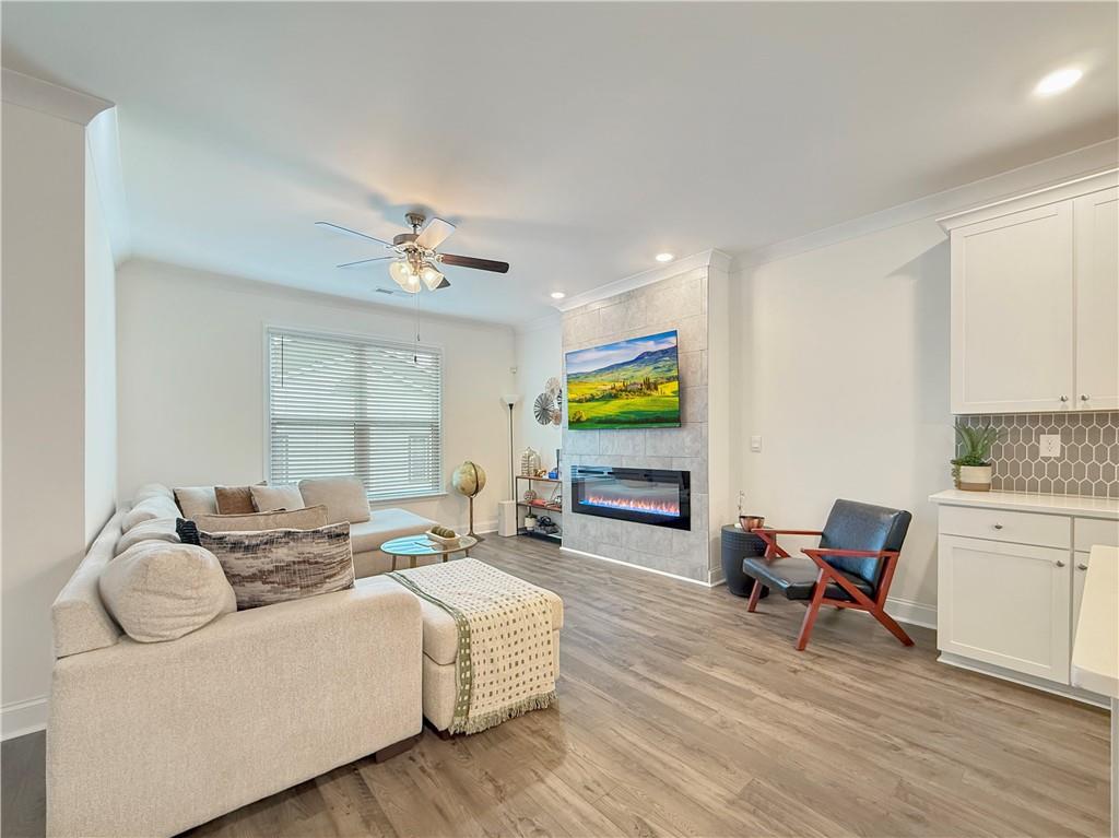 1160 Kendron Lane, Unit 16 Atlanta, GA 30329 - Photo 13 of 39 a living room with furniture and a fireplace