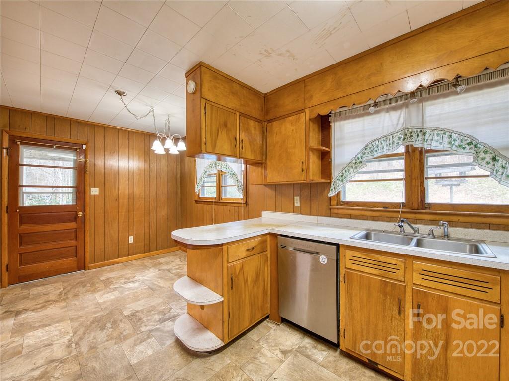 208 Balsam Ridge Road Waynesville, NC 28786 - Photo 12 of 25 a bathroom with a sink and mirror
