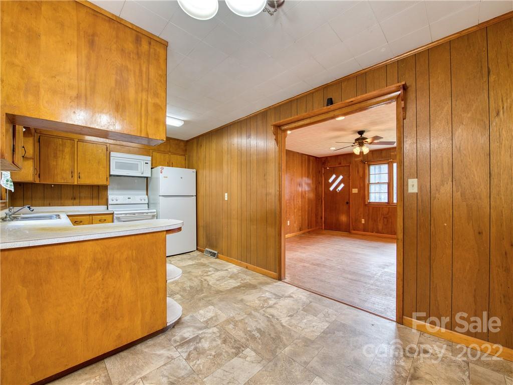 208 Balsam Ridge Road Waynesville, NC 28786 - Photo 13 of 25 a view of a refrigerator in kitchen