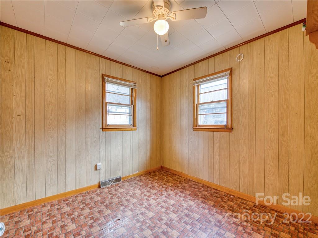 208 Balsam Ridge Road Waynesville, NC 28786 - Photo 22 of 25 a view of an empty room with a window