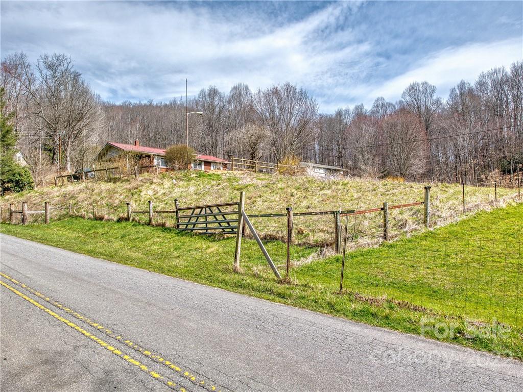 208 Balsam Ridge Road Waynesville, NC 28786 - Photo 7 of 25 a view of an outdoor space and lakeside