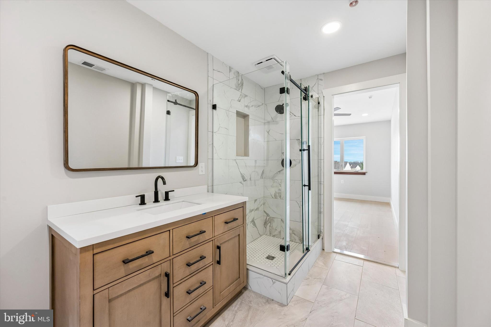 457 Greenridge Road Glenmoore, PA 19343 - Photo 11 of 20 Primary bath - tiled shower and floor