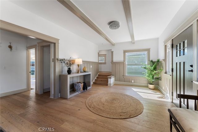 wooden floor and dining room view with wooden floor