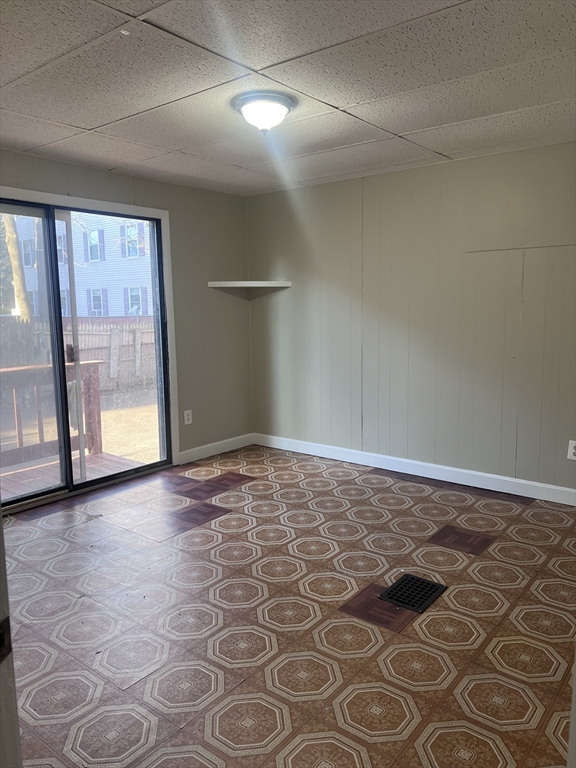 234 Clark Avenue, Unit 1 Chelsea, MA 02150 - Photo 4 of 6 a view of empty room with wooden floor