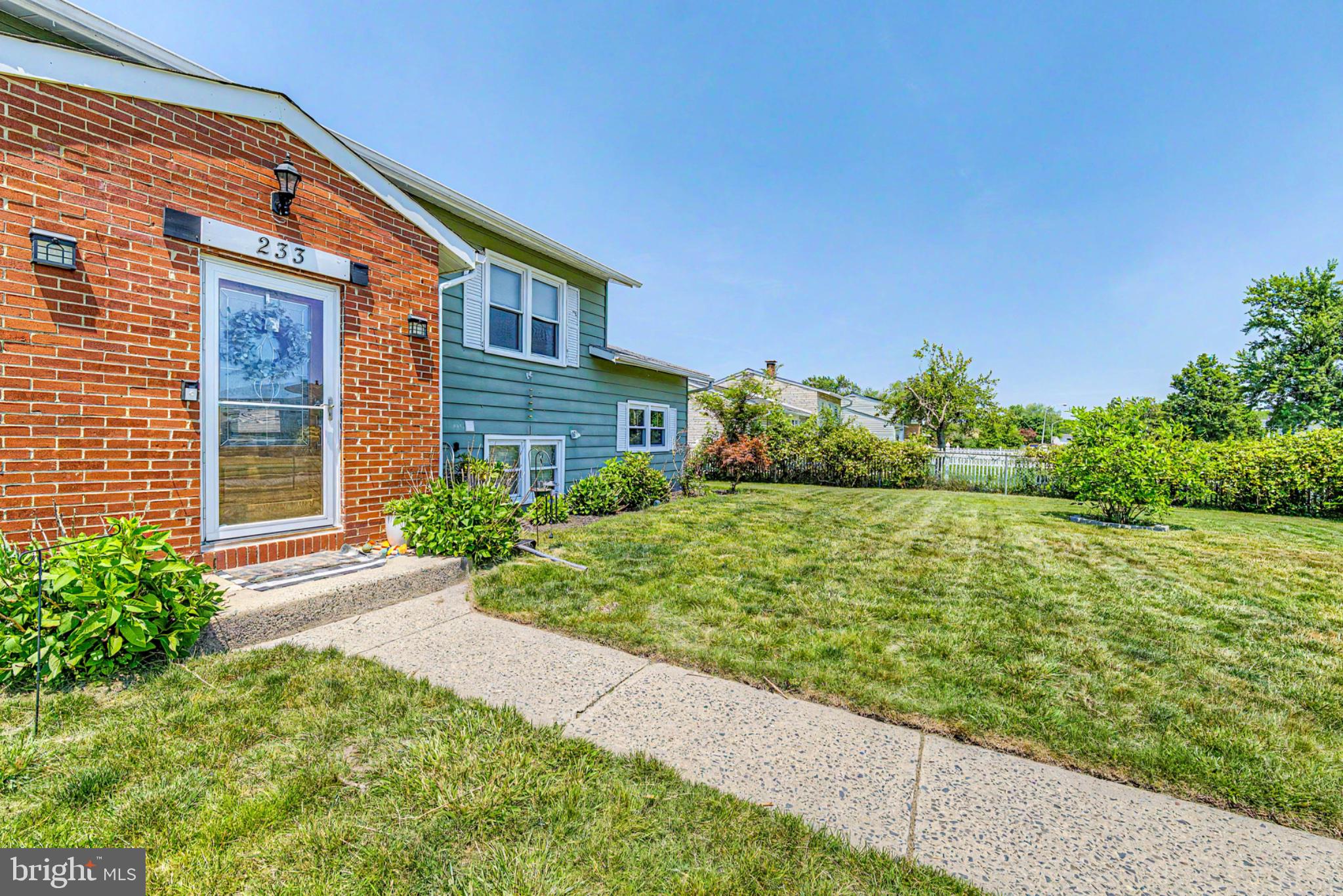 233 Purdue Avenue Pemberton, NJ 08068 - Photo 4 of 31 Charming home with lush green lawn.