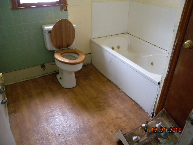 6261 Dillons Mill Road Callaway, VA 24067 - Photo 12 of 16 a bathroom with a toilet and a bathtub
