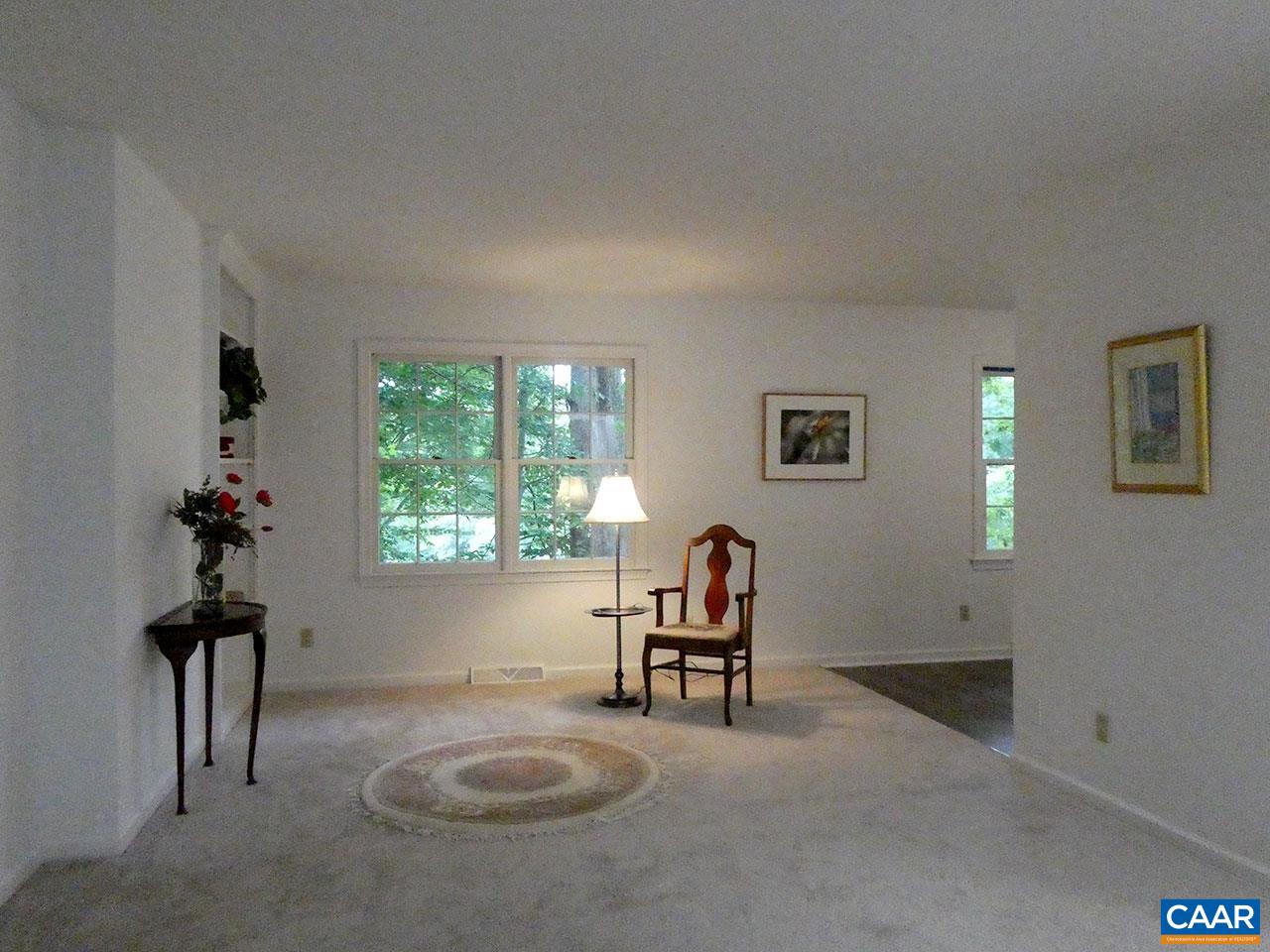 723 Shamrock Road Charlottesville, VA 22903 - Photo 4 of 22 a view of a livingroom with furniture and a window