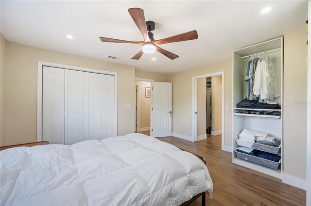 a bathroom with a toilet a sink and shower