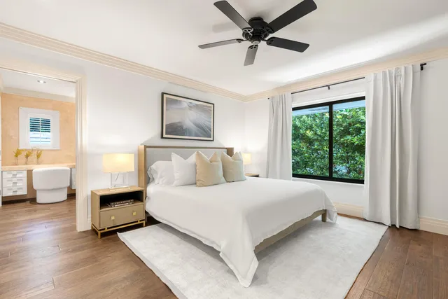 a house with swimming pool in front of it