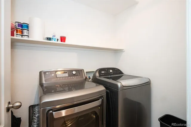 an aerial view of a house with a yard and garden