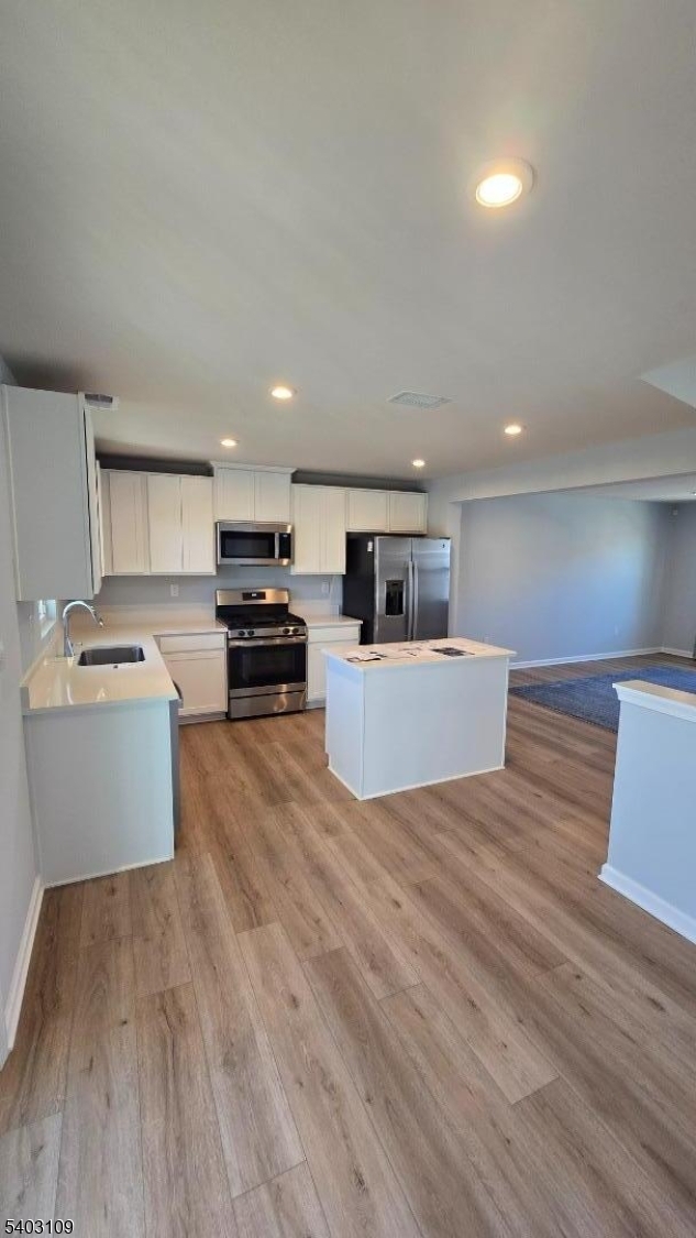 11 Limestone Boulevard Washington, NJ 07882 - Photo 3 of 18 a view of kitchen with cabinets microwave and stove