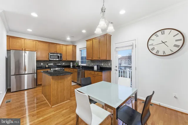 a very nice looking kitchen with a large window