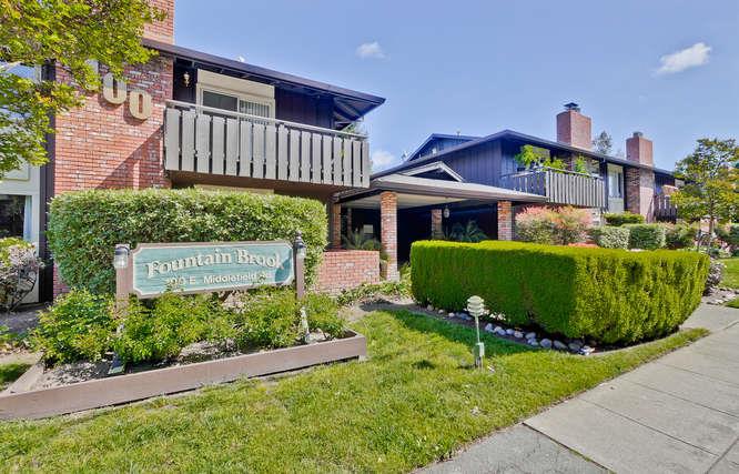 100 East Middlefield Road, Unit 2B Mountain View, CA 94043 - Photo 1 of 28 a front view of a house with garden