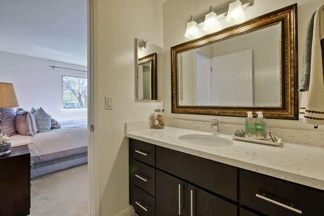 100 East Middlefield Road, Unit 2B Mountain View, CA 94043 - Photo 17 of 28 a en suite bathroom with a double vanity sink and a mirror