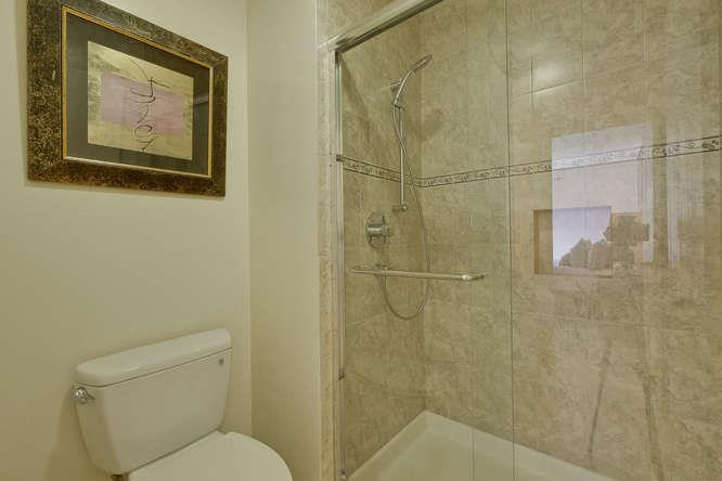 100 East Middlefield Road, Unit 2B Mountain View, CA 94043 - Photo 18 of 28 a bathroom with a toilet and a shower