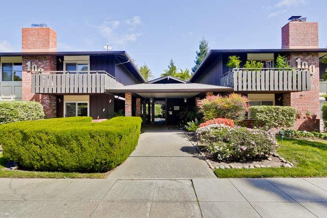 100 East Middlefield Road, Unit 2B Mountain View, CA 94043 - Photo 3 of 28 a front view of a house with garden