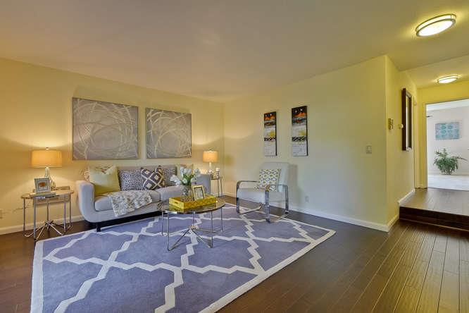 100 East Middlefield Road, Unit 2B Mountain View, CA 94043 - Photo 5 of 28 a living room with furniture and wooden floor