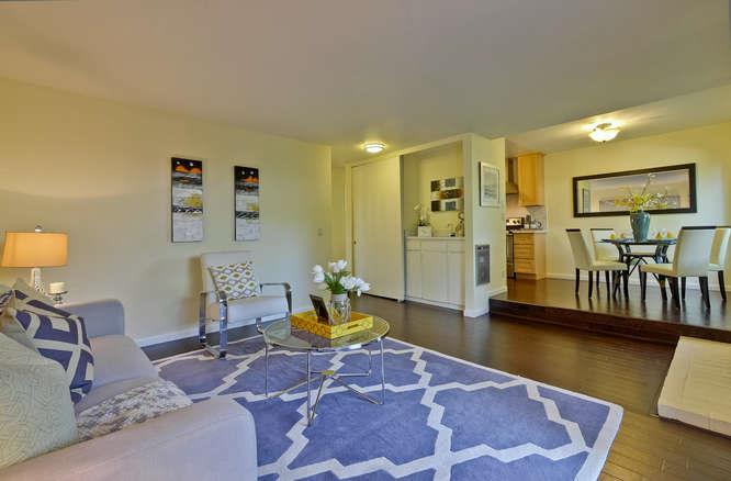 100 East Middlefield Road, Unit 2B Mountain View, CA 94043 - Photo 6 of 28 a spacious bedroom with a bed and a couch
