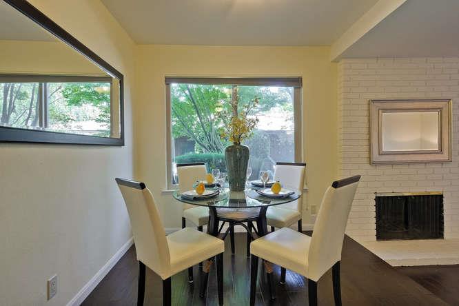 100 East Middlefield Road, Unit 2B Mountain View, CA 94043 - Photo 8 of 28 a view of a dining room with furniture and a window