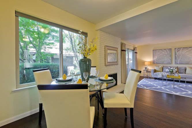 100 East Middlefield Road, Unit 2B Mountain View, CA 94043 - Photo 9 of 28 a view of a dining room with furniture window and outside view