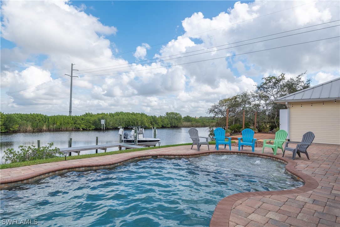 7600 Riverside Drive Punta Gorda, FL 33982 - Photo 29 of 35 a view of a lake with a sitting area