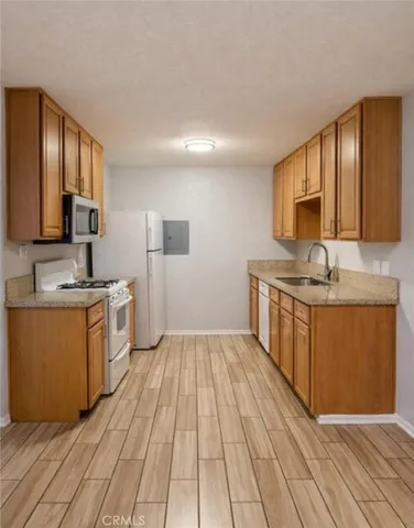 a view of a kitchen from the kitchen