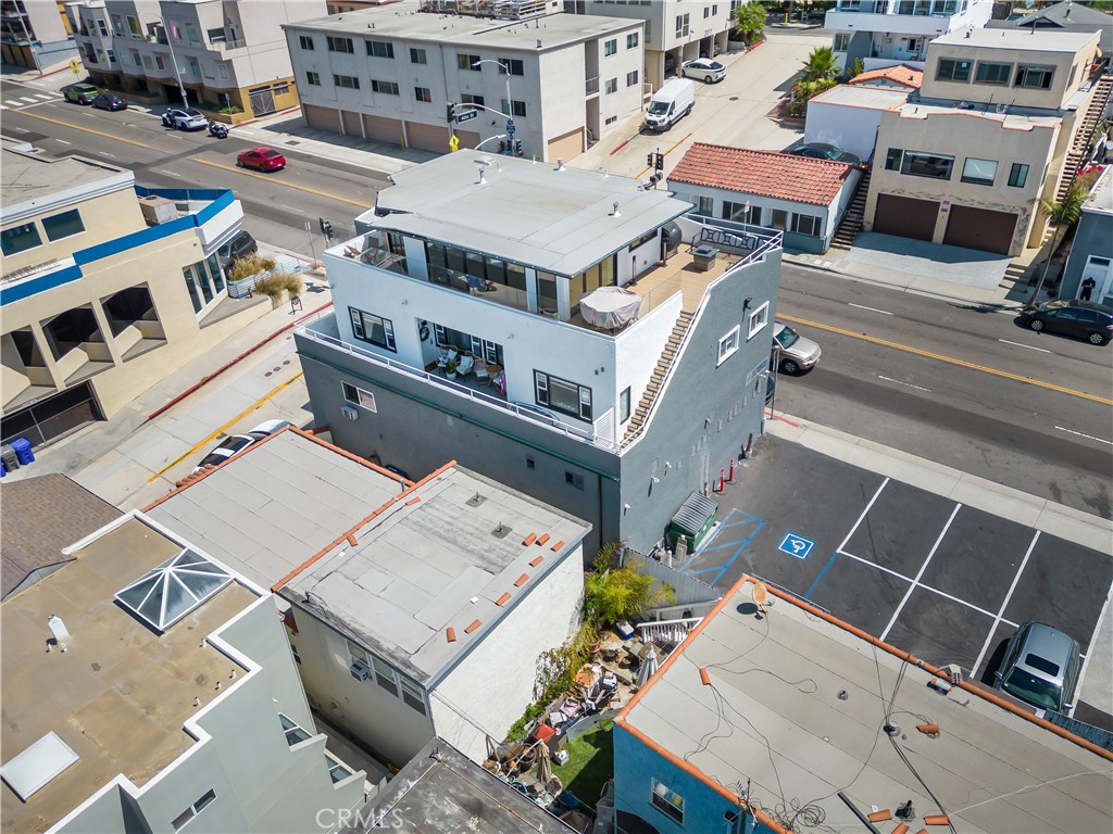 230 40th Street, Unit 1 Manhattan Beach, CA 90266 - Photo 2 of 19 a view of a building with many windows
