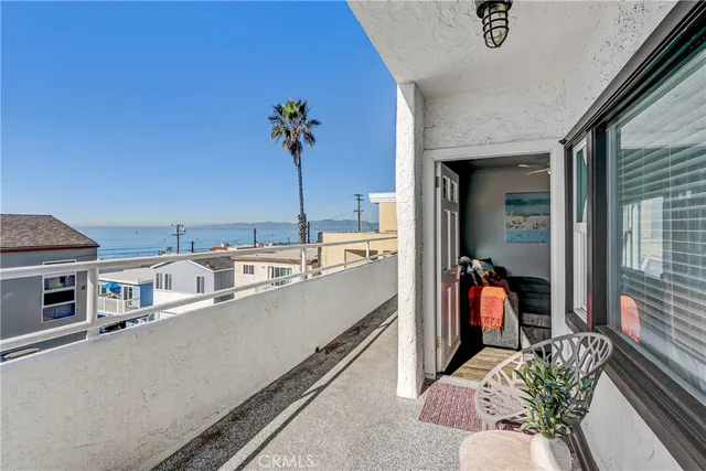 a kitchen with stainless steel appliances granite countertop a white cabinets and a stove top oven