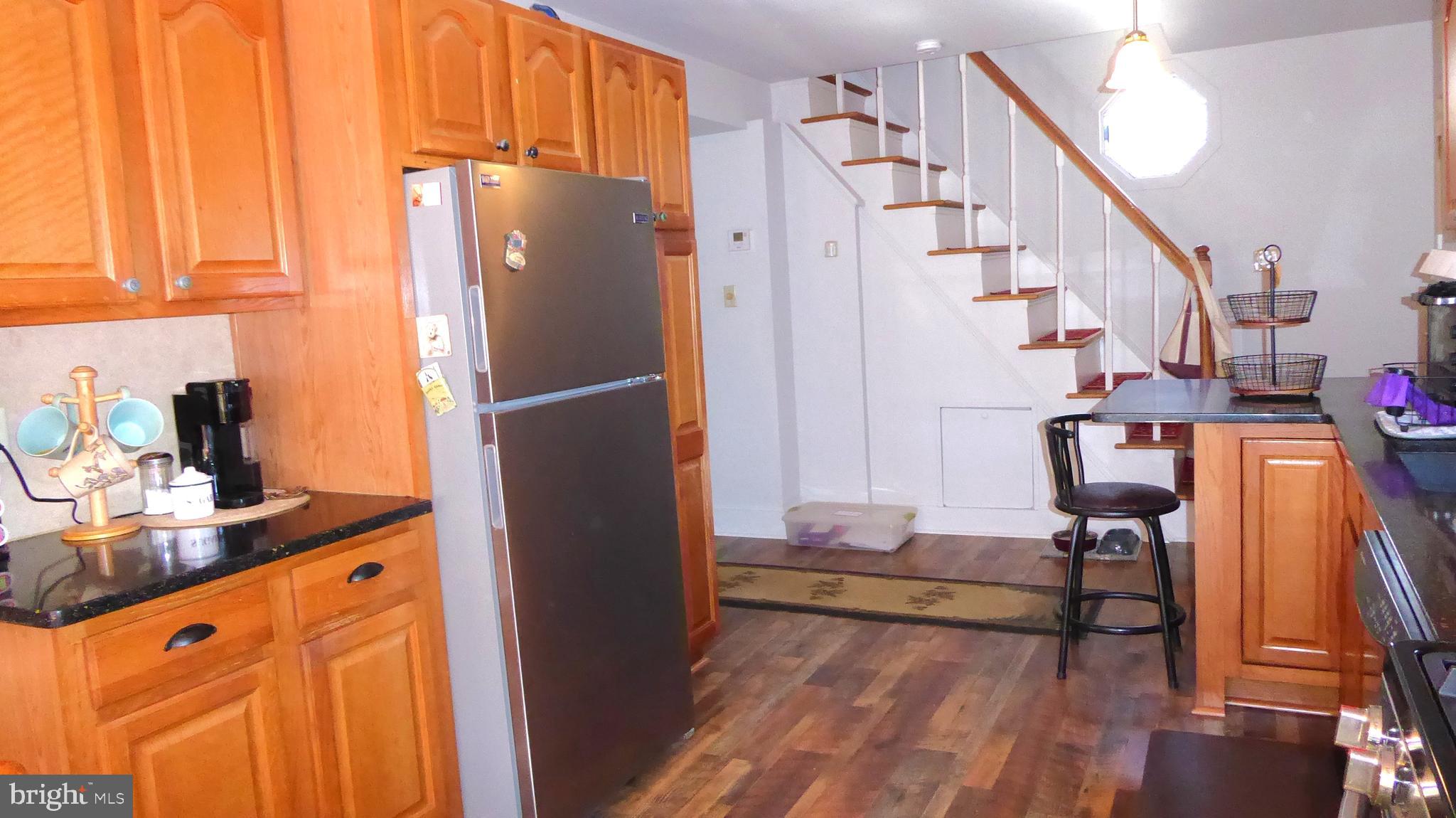 110 Daffodil Road Millville, NJ 08332 - Photo 11 of 37 a kitchen with stainless steel appliances granite countertop a refrigerator and a stove