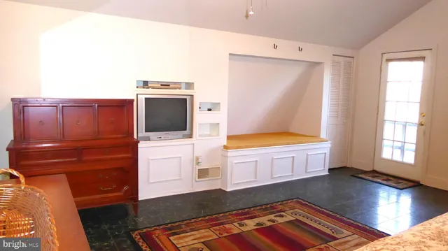 a kitchen with a stove and a microwave