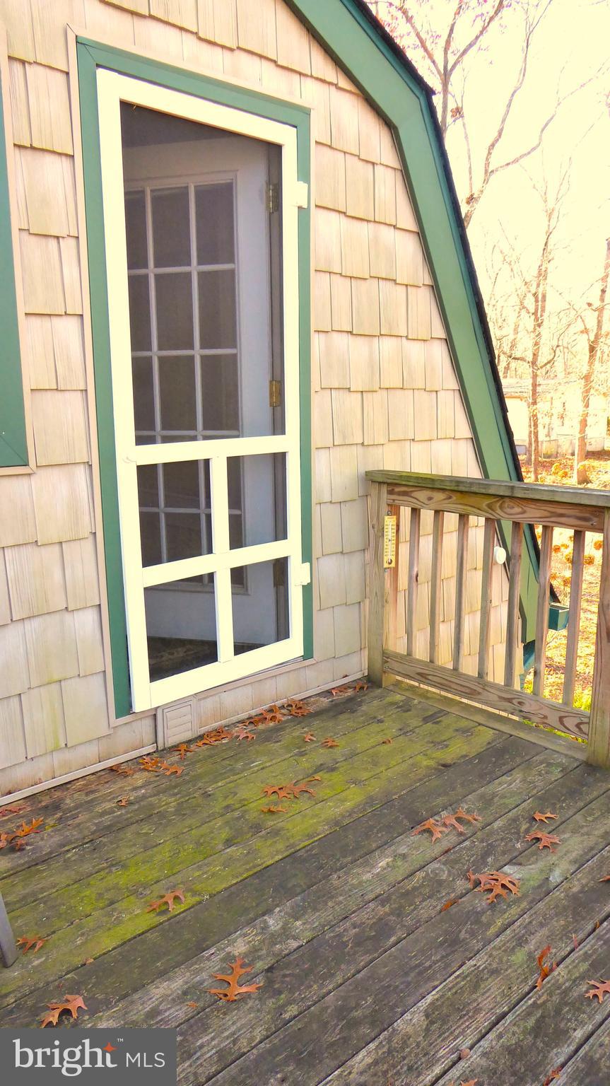 110 Daffodil Road Millville, NJ 08332 - Photo 23 of 37 a view of an empty room with a window