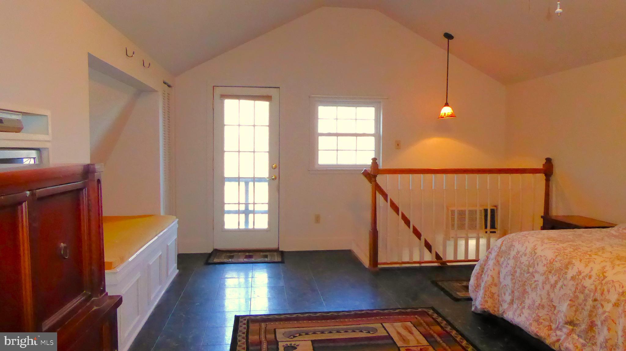 110 Daffodil Road Millville, NJ 08332 - Photo 24 of 37 a view of a bedroom with wooden floor and windows
