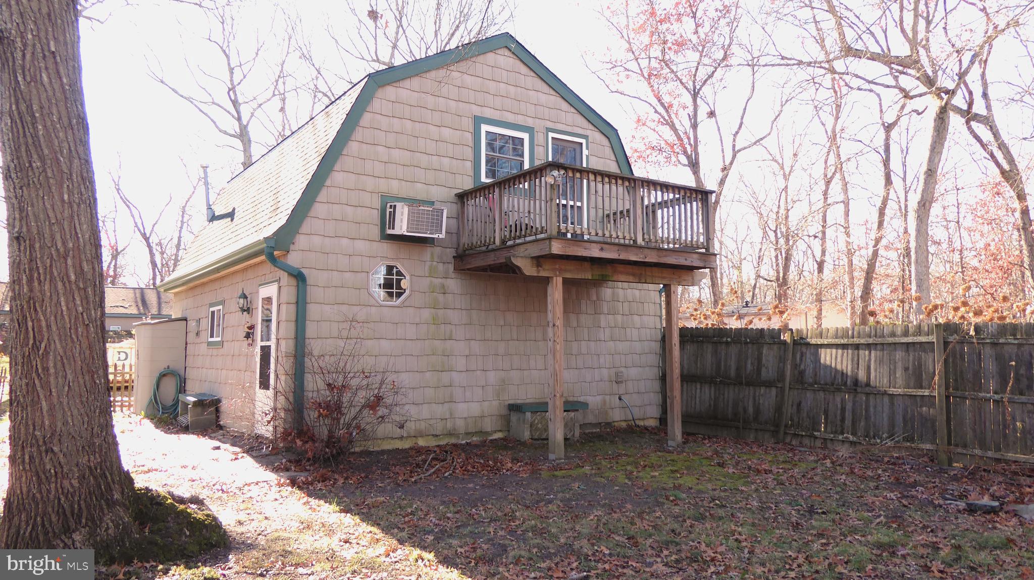 110 Daffodil Road Millville, NJ 08332 - Photo 32 of 37 a view of a house with a yard
