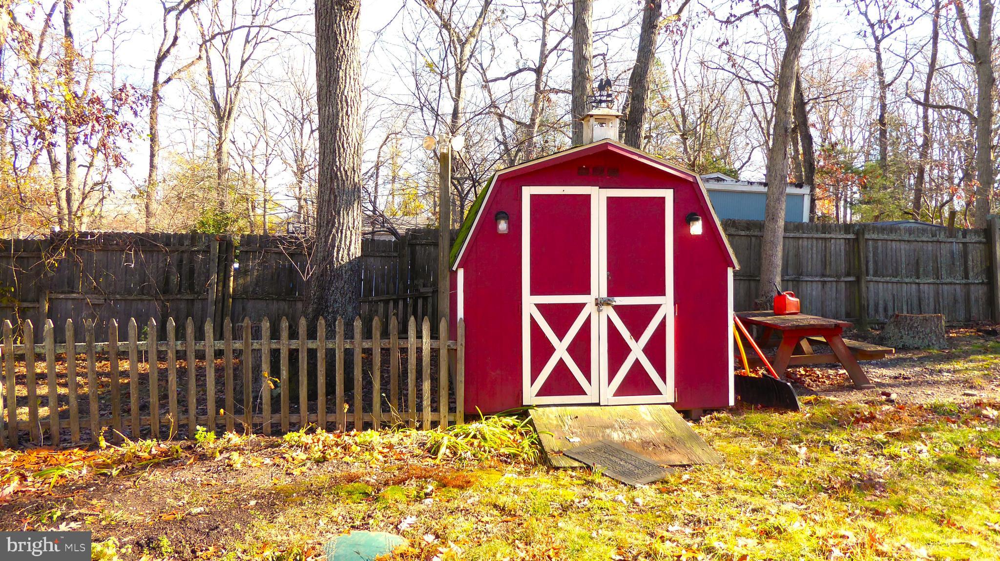 110 Daffodil Road Millville, NJ 08332 - Photo 36 of 37 a view of wooden fence and a sign of the house