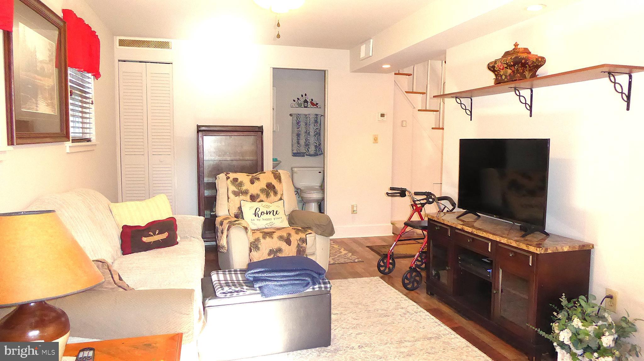 110 Daffodil Road Millville, NJ 08332 - Photo 6 of 37 a living room with furniture and a flat screen tv